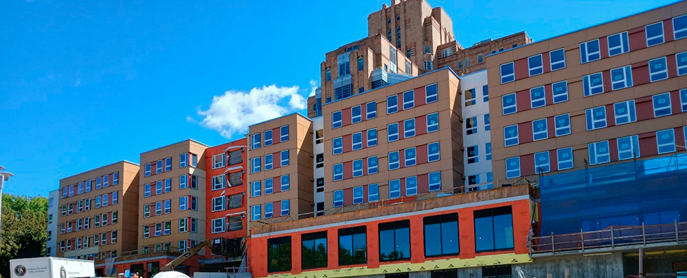 photo of beacon hill village project with the historic pacmed tower in the background