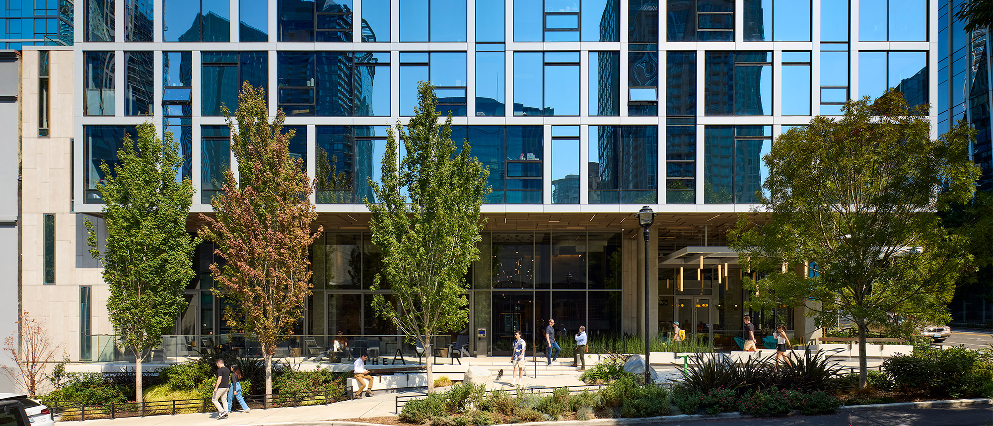 photo of the streetscape during a sunny day at the ayer in downtown seattle